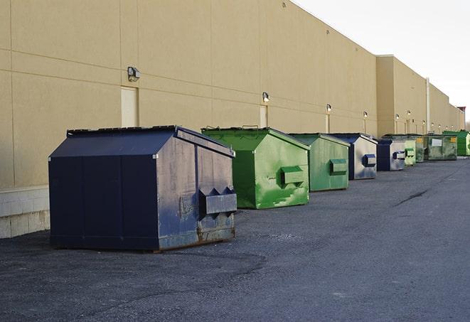 a site supervisor checking a construction dumpster in Casselberry